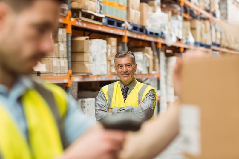 Warehouse worker scanning barcode for inventory accuracy